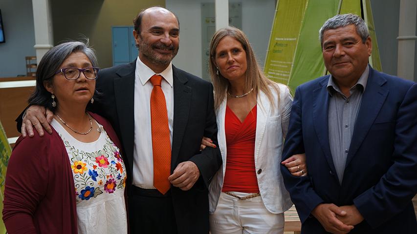 Tres directores junto al Director Nacional.
