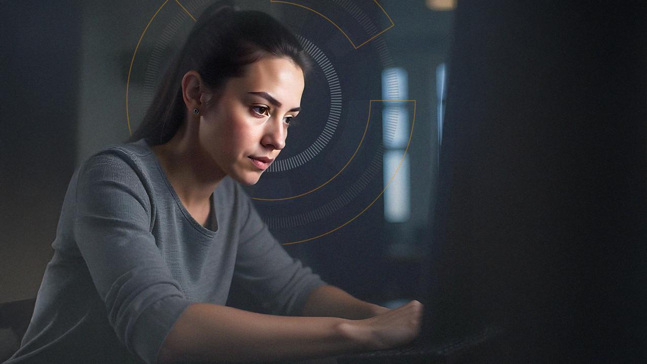 Imagen de mujer frente escribiendo frente a un computador